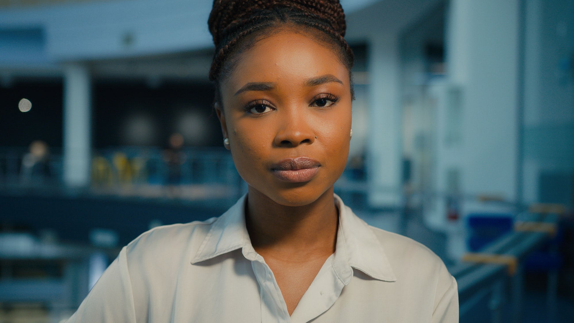 Close-up business portrait headshot serious pensive sad calm African American businesswoman girl